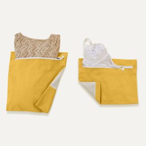 Product photo of Garment Saver Folding Bag in Tan color and in use