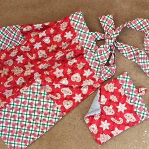 photo of Garment Saver Half Apron Set in Holiday Cookies pattern (flat view)